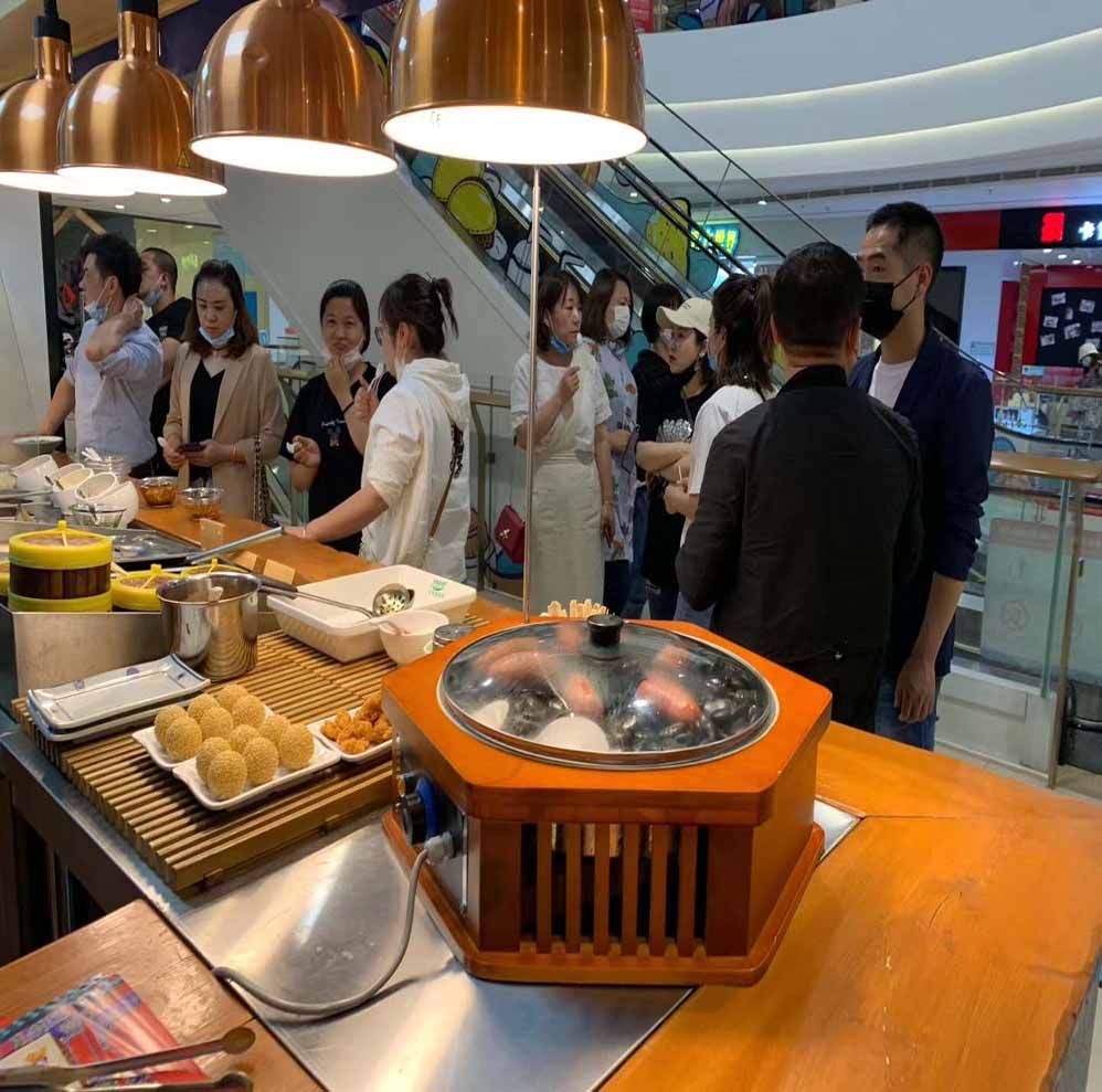 漢(han)伯尅石鍋烤腸西(xi)安王媽涼(liang)皮郃作商